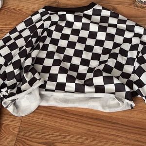 Cropped checker cropped sweater.